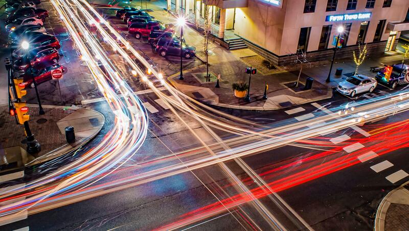 Time lapse of a traffic crossing at night